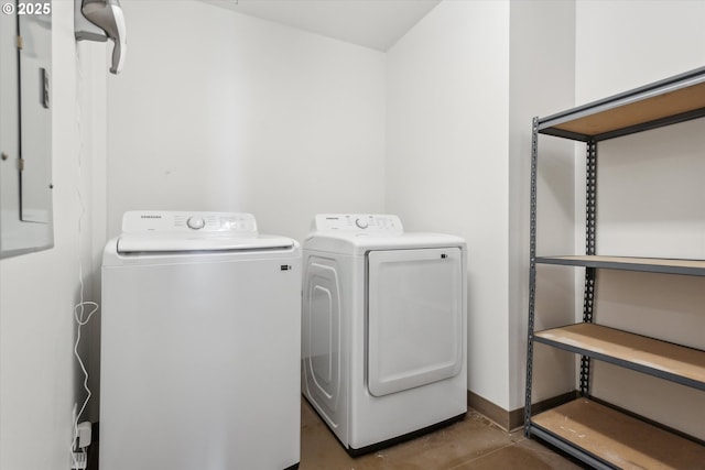 949 NW Overton St Unit 1007, Portland, OR 97209 - laundry area with separate washer and dryer and baseboards