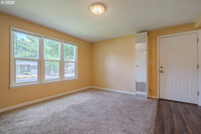 3211 E 17th St, Vancouver, WA 98661 - unfurnished room featuring a heating unit and carpet