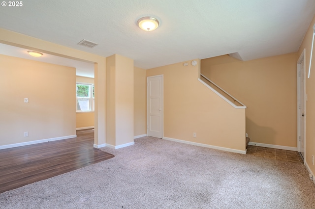 3211 E 17th St, Vancouver, WA 98661 - unfurnished living room featuring carpet flooring and stairway