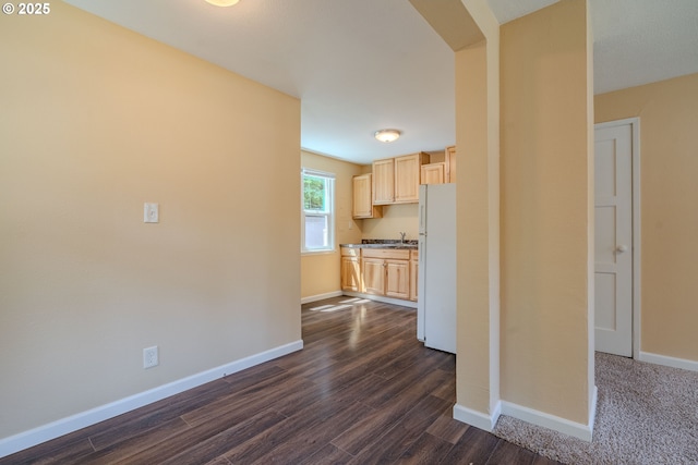 3211 E 17th St, Vancouver, WA 98661 - kitchen featuring light brown cabinetry, freestanding refrigerator, and dark wood-type flooring