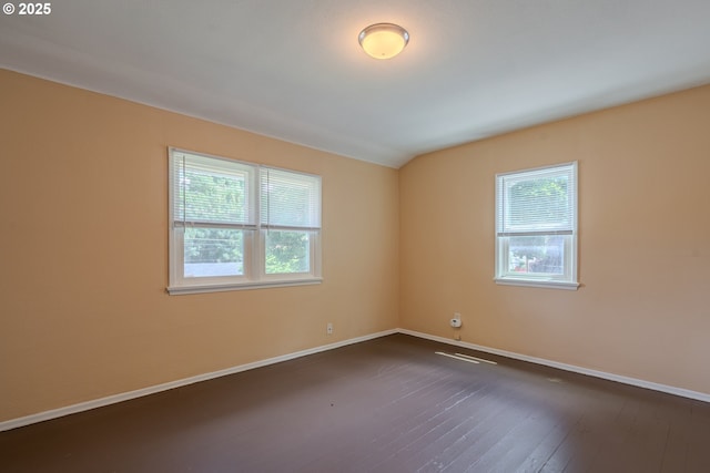 3211 E 17th St, Vancouver, WA 98661 - unfurnished room with healthy amount of natural light, dark wood finished floors, and vaulted ceiling