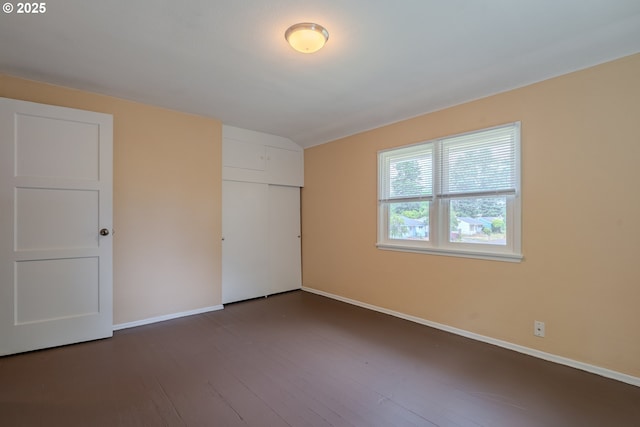 3211 E 17th St, Vancouver, WA 98661 - unfurnished bedroom featuring dark wood-style flooring and a closet