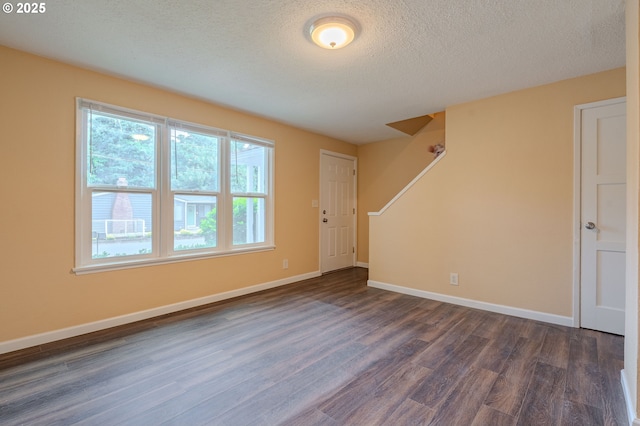 3211 E 17th St, Vancouver, WA 98661 - entryway featuring dark wood finished floors and a textured ceiling