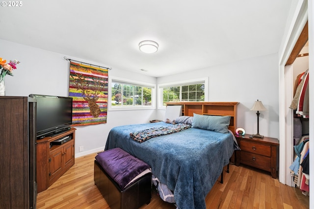 35111 Jefferson Ln, Astoria, OR 97103 - bedroom with light wood-style floors and baseboards
