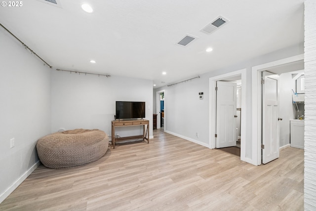 35111 Jefferson Ln, Astoria, OR 97103 - sitting room with light wood-style floors and recessed lighting