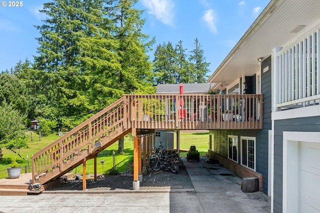 35111 Jefferson Ln, Astoria, OR 97103 - view of jungle gym featuring stairway, a yard, and a deck