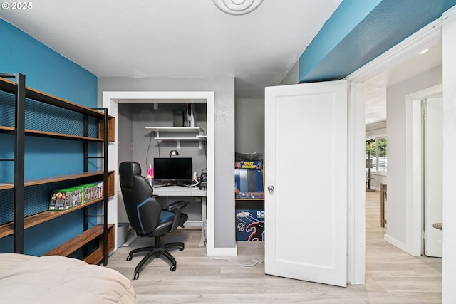 35111 Jefferson Ln, Astoria, OR 97103 - bedroom featuring wood finished floors and an office area