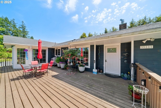 35111 Jefferson Ln, Astoria, OR 97103 - wooden terrace with outdoor dining area