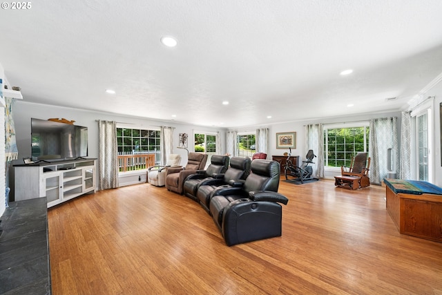 35111 Jefferson Ln, Astoria, OR 97103 - living room with crown molding, wood finished floors, and recessed lighting