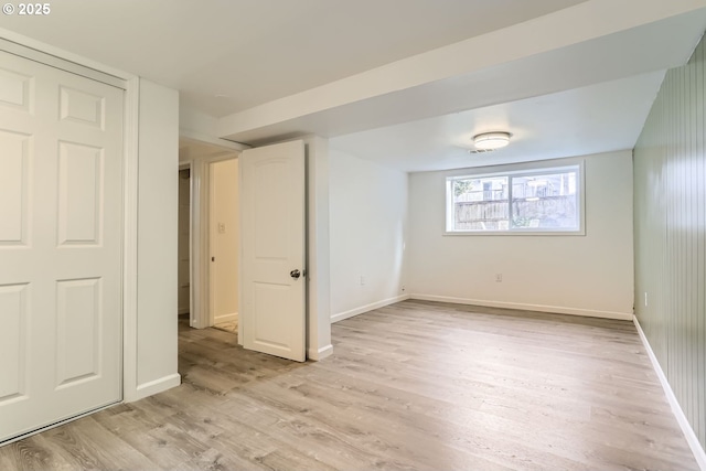 spare room with light hardwood / wood-style floors