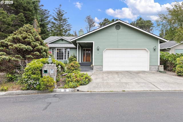 20 Wild Winds St, Florence, OR 97439 - ranch-style home featuring driveway, an attached garage, and a chimney