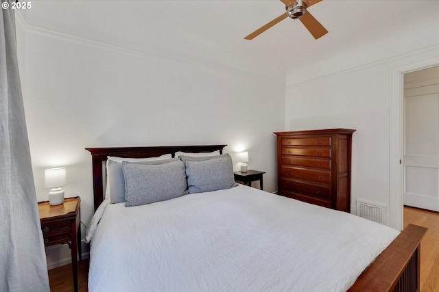 1534 NE 26th Ave Unit 8, Portland, OR 97232 - bedroom with wood finished floors and ceiling fan