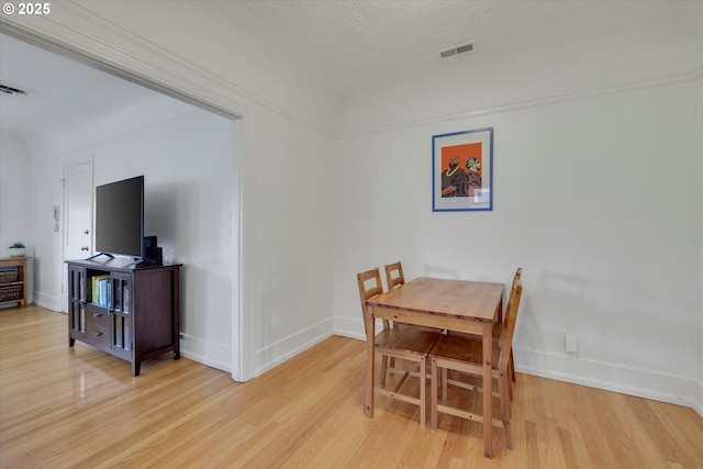 1534 NE 26th Ave Unit 8, Portland, OR 97232 - dining area with wood finished floors and baseboards