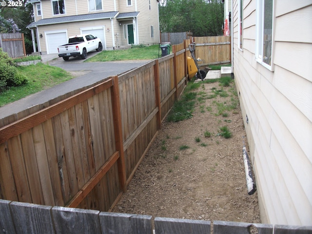 35087 Roberts Ln, Saint Helens, OR 97051 - view of yard with an attached garage and fence
