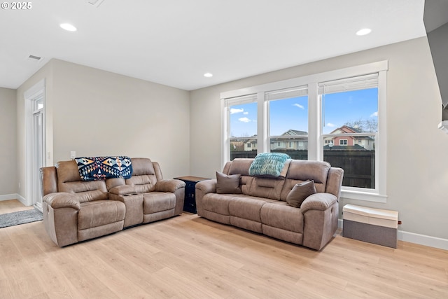 living room featuring light wood-type flooring