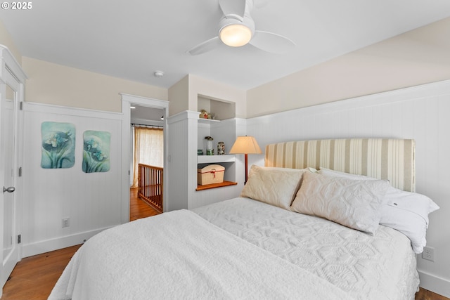 15436 Oceanview Dr, Brookings, OR 97415 - bedroom with a ceiling fan, baseboards, and wood finished floors