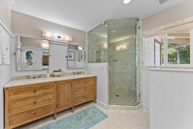 15436 Oceanview Dr, Brookings, OR 97415 - bathroom featuring double vanity, a stall shower, and a sink