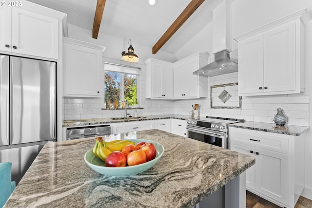 15436 Oceanview Dr, Brookings, OR 97415 - kitchen with a sink, dark stone counters, white cabinetry, appliances with stainless steel finishes, and decorative backsplash