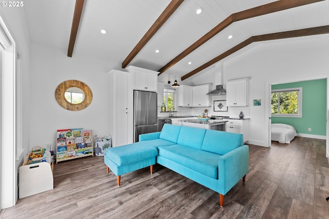 15436 Oceanview Dr, Brookings, OR 97415 - living area with baseboards, recessed lighting, vaulted ceiling with beams, and wood finished floors