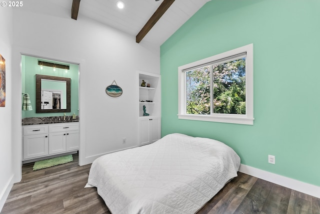 15436 Oceanview Dr, Brookings, OR 97415 - bedroom featuring ensuite bathroom, wood finished floors, baseboards, and vaulted ceiling with beams