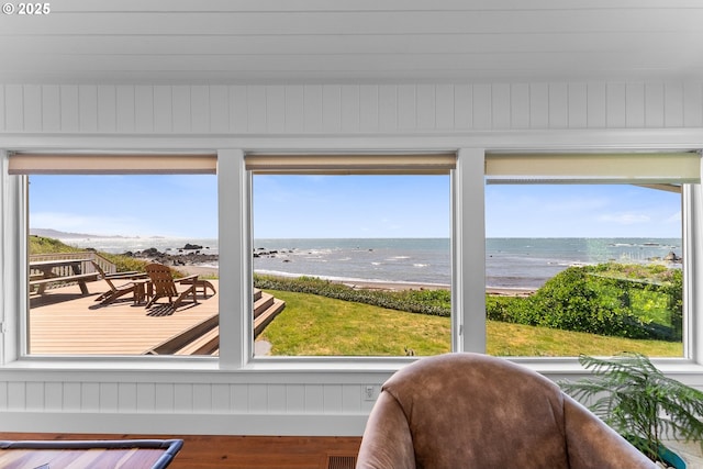 15436 Oceanview Dr, Brookings, OR 97415 - sunroom featuring a water view, plenty of natural light, and wood finished floors