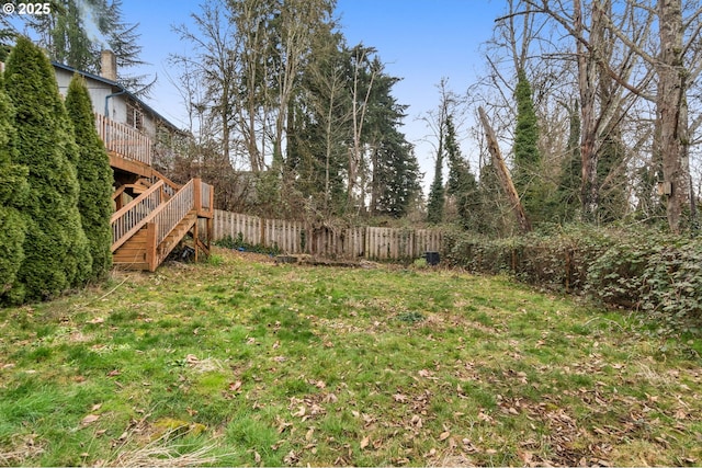 view of yard with a wooden deck