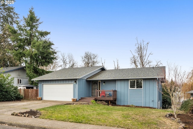 single story home with a garage and a front yard