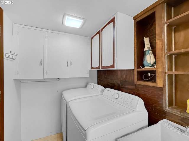 55 Irving St, Cathlamet, WA 98612 - washroom with washer and clothes dryer and cabinet space