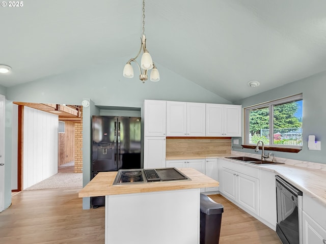 55 Irving St, Cathlamet, WA 98612 - kitchen featuring black appliances, lofted ceiling, a center island, white cabinets, and butcher block countertops