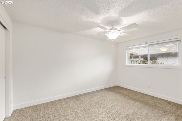 3832 NE 45th St Unit B, Vancouver, WA 98661 - empty room featuring carpet floors, ceiling fan, and a textured ceiling
