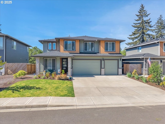 traditional home featuring a garage, driveway, and a residential view