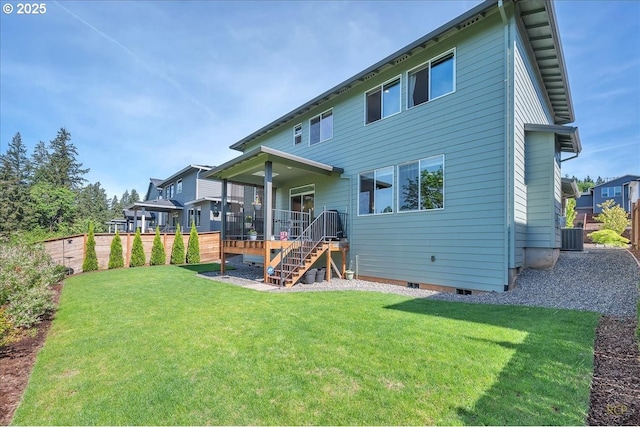 back of property featuring a residential view, stairway, and a deck