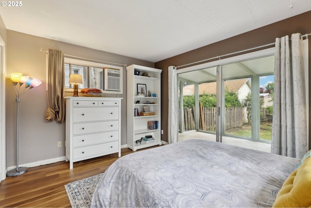 421 Willamette St, Oregon City, OR 97045 - bedroom featuring wood finished floors, access to exterior, and an AC wall unit