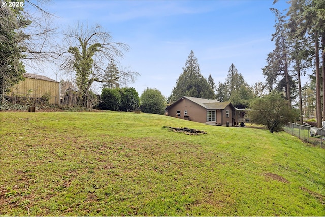 view of yard featuring fence