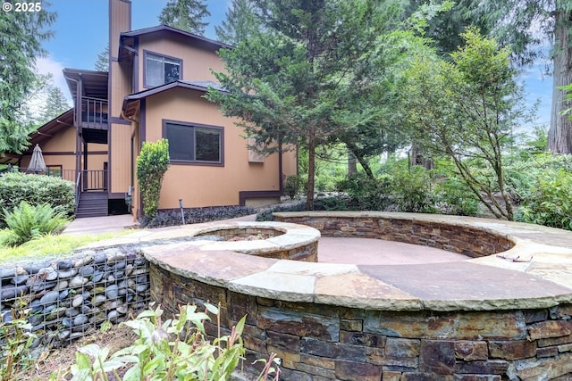 17002 NE 50th Ave, Vancouver, WA 98686 - view of front of property featuring a fire pit, a chimney, and a patio