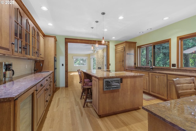 17002 NE 50th Ave, Vancouver, WA 98686 - kitchen featuring healthy amount of natural light, light wood-type flooring, a sink, and recessed lighting