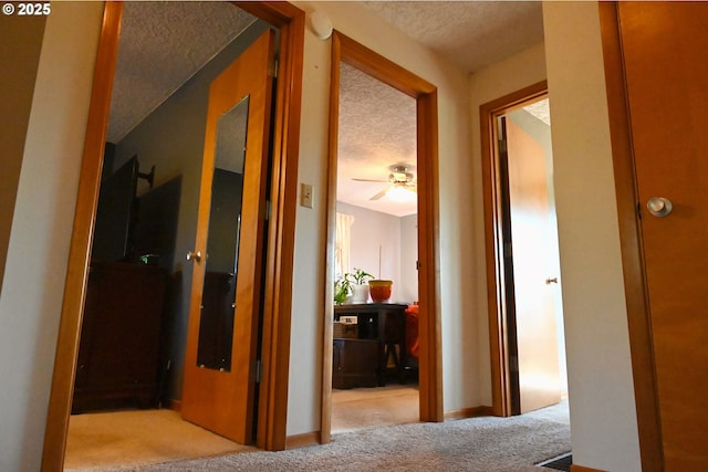 7811 NE 78th St, Vancouver, WA 98662 - hall with baseboards, visible vents, carpet, and a textured ceiling