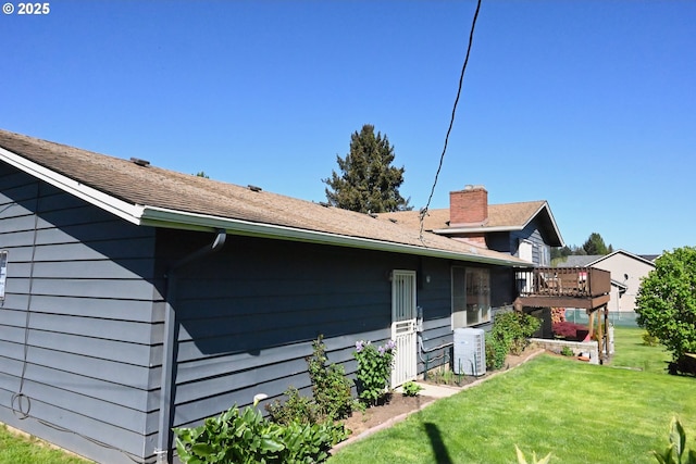 7811 NE 78th St, Vancouver, WA 98662 - view of side of property featuring a yard and a deck