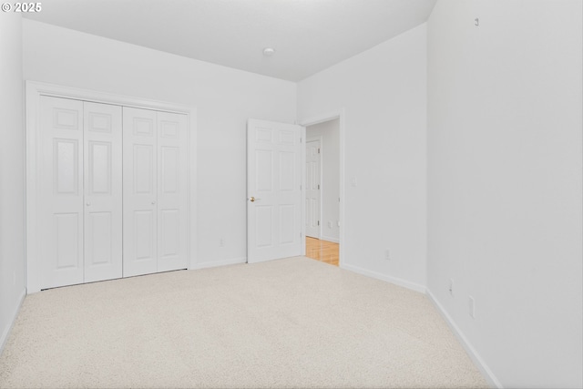 301 Chinook St, Molalla, OR 97038 - unfurnished bedroom with carpet flooring, baseboards, and a closet