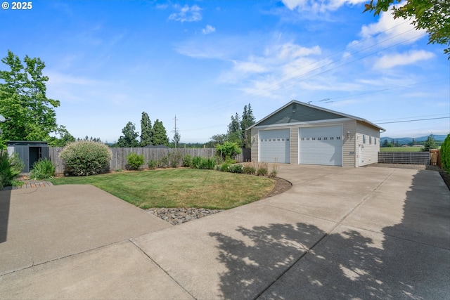 301 Chinook St, Molalla, OR 97038 - view of yard with an outdoor structure and a garage
