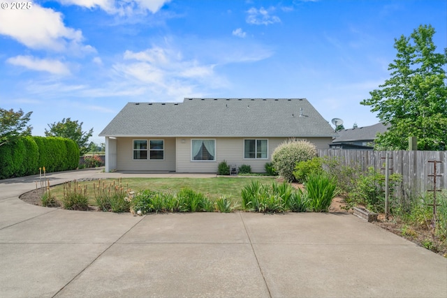 301 Chinook St, Molalla, OR 97038 - rear view of house with a patio area and a shingled roof