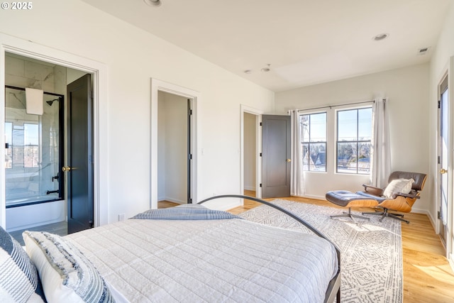 bedroom with baseboards, recessed lighting, visible vents, and light wood-style floors