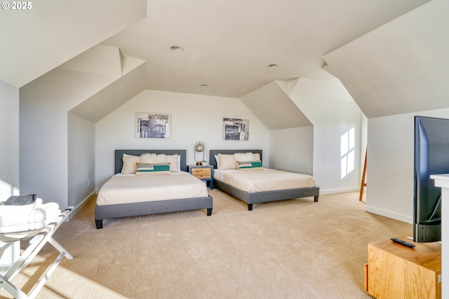 bedroom featuring carpet, baseboards, and vaulted ceiling