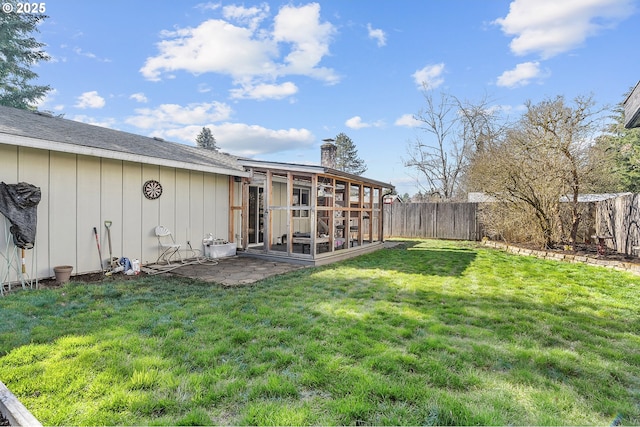 view of yard featuring a fenced backyard