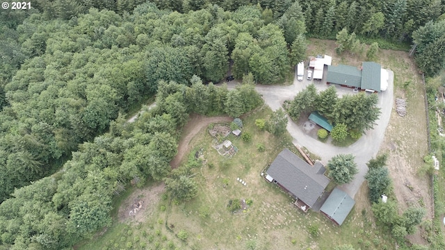 drone / aerial view with a view of trees