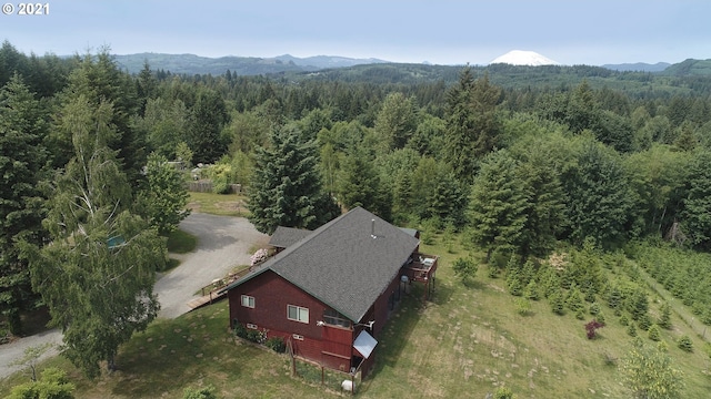 bird's eye view featuring a mountain view and a forest view