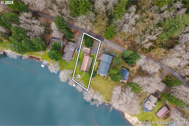 birds eye view of property featuring a water view