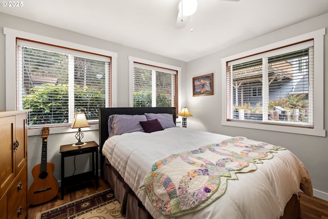 bedroom featuring ceiling fan and wood finished floors