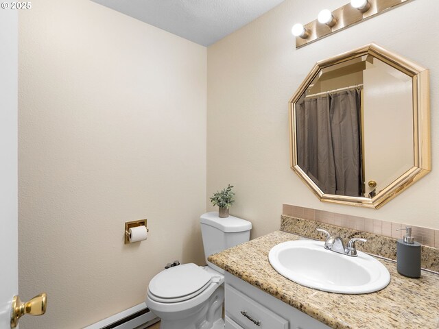 7116 SW Murray Blvd, Beaverton, OR 97008 - full bathroom with vanity, toilet, and baseboard heating