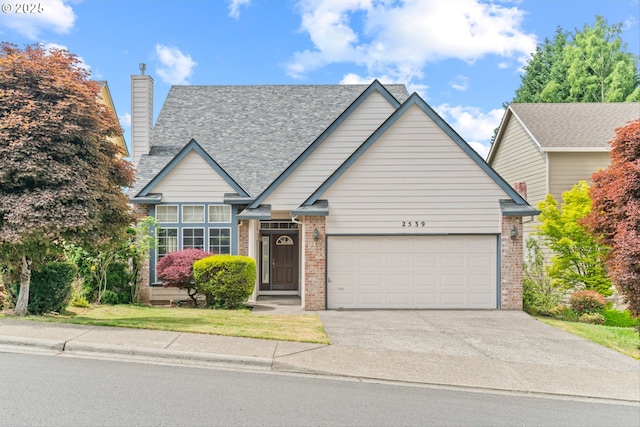 2539 NW 167th Ave, Beaverton, OR 97006 - view of front of property featuring brick siding, a garage, driveway, and a chimney